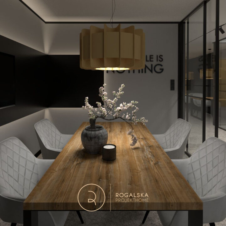 Loftowy quiet room z dużym drewnianym biurkiem na metalowych nogach, szarymi welurowymi fotelami i czarną, podświetlaną LED-ami ścianą będącą tłem dla TV.