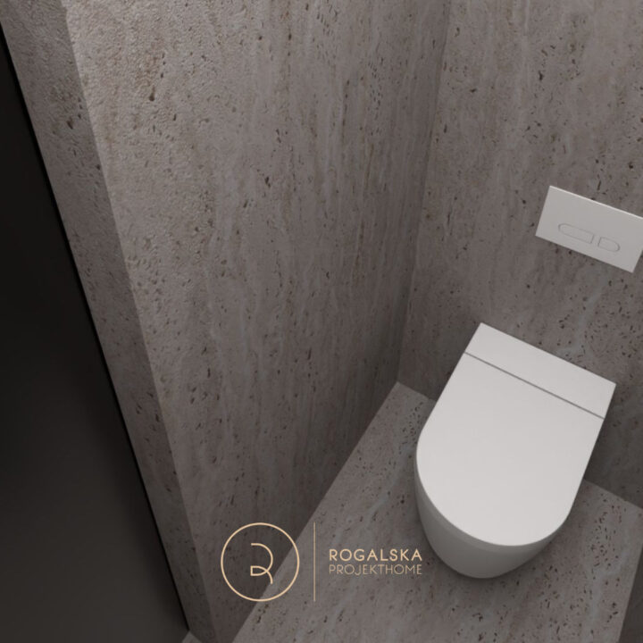 Minimalistyczna toaleta wykończona szarym kamieniem, ukryta za przesuwnymi, pełnymi drzwiami w kolorze czarnym z wyciętym sercem.