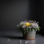 Idealna czarna farba, która nie pozostawia zacieków. Piękny czarny, głęboki kolor na ścianie, kwiaty w wiaderku.